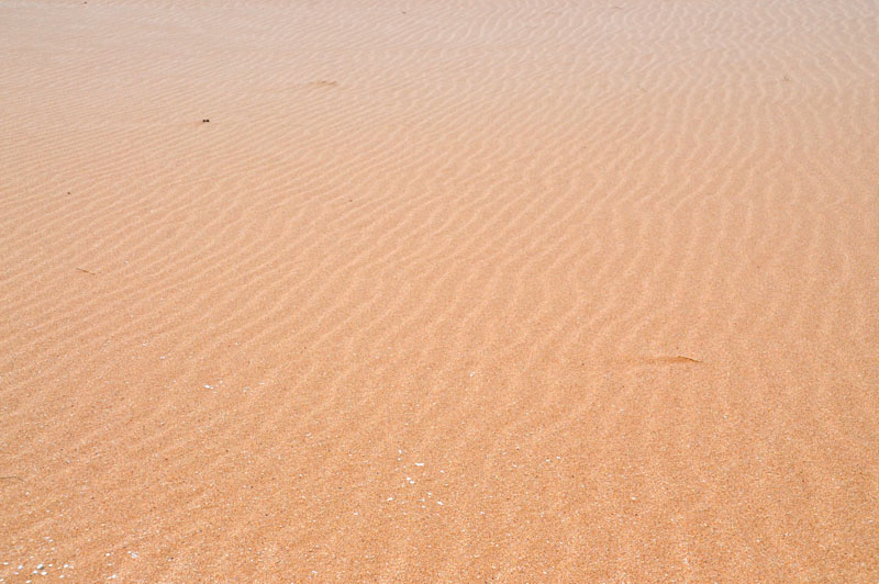 モロカイ島パポハクビーチの足跡のない砂浜